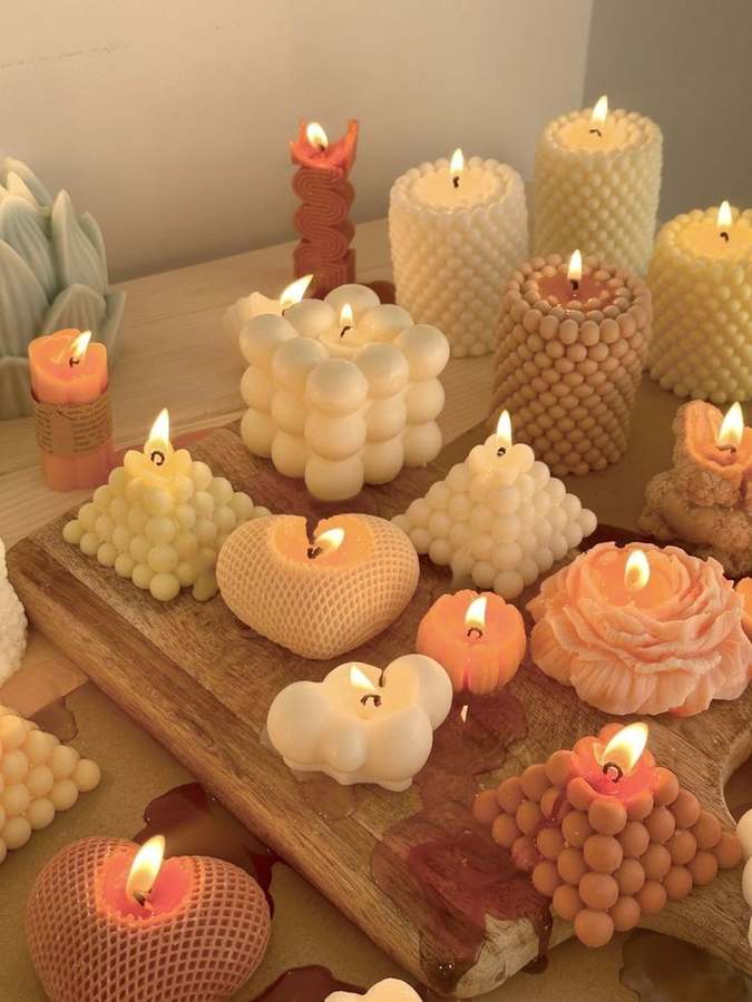 Velas tipo rosa en colores variados